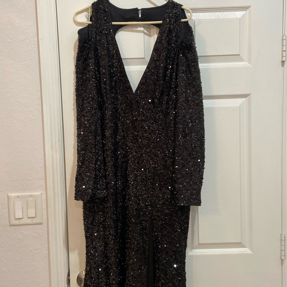 Black Sequin dress. Cold shoulder, semi long train, leg slit.